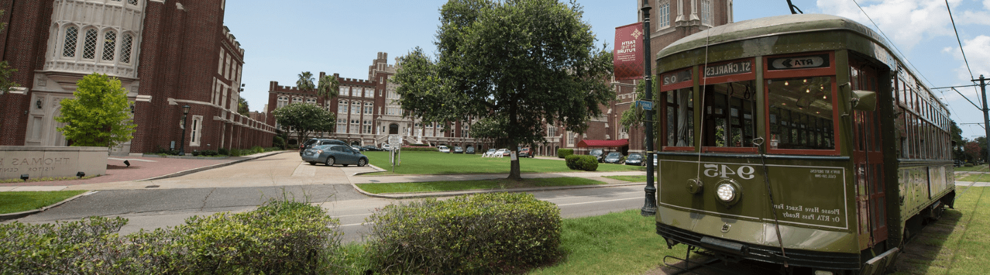 Loyola's campus with a passing streetcar.